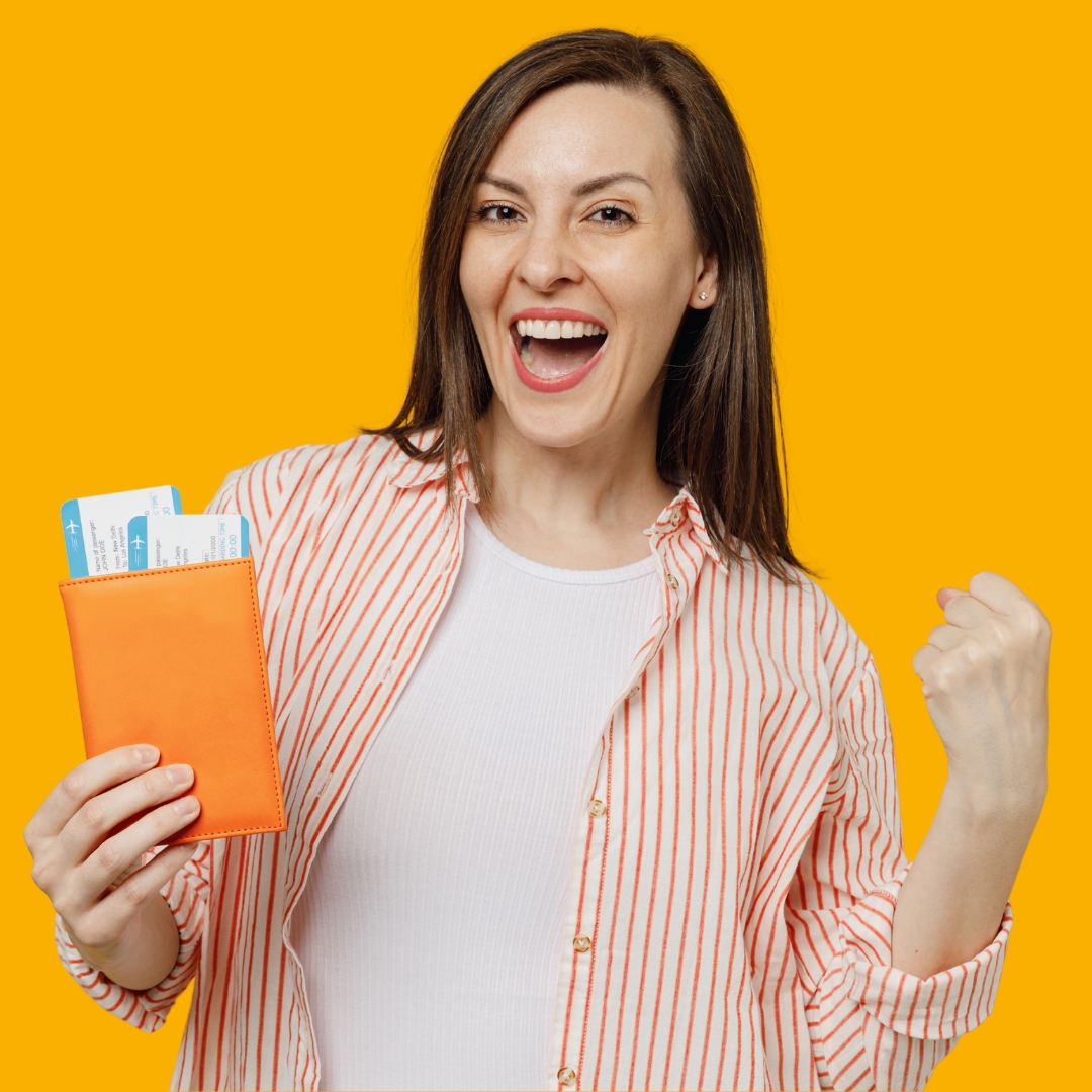 Happy woman with tickets.